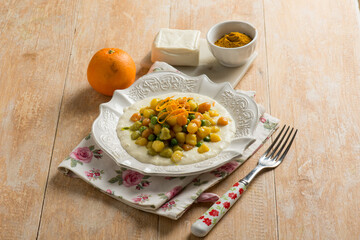 italian gnocchi with cheese cream and orange peel
