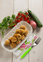 vegetarian meat ball with rice zucchinis and tomatoes