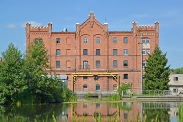 The building of the old water mill on the banks of the Angrapa River, 1898. Ozersk, Kaliningrad...