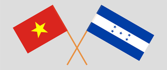 Crossed flags of Vietnam and Honduras