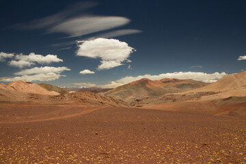 Desert landscape high in the Andes mountain range. View of the brown land and colorful mountains in Laguna Brava, La Rioja, Argentina.