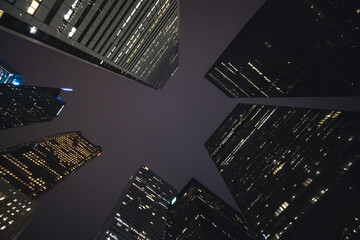 Urban Night Cityscape View with Dense Apartment Buildings in a Metropolitan City for a Futuristic...
