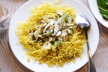 pasta with pesto sauce on a plate