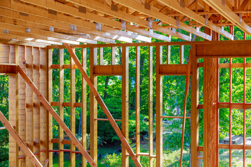 Construction home framing on residential beam framework wooden new house