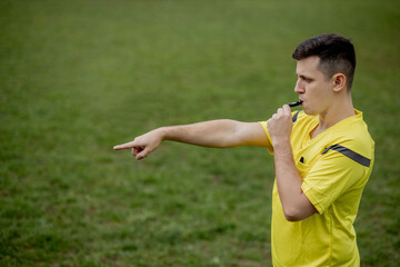 Referee indicates a violation of the rules. Concept of sport, rules violation, controversial...