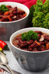 Two bowls with traditional Georgian dish - lobio