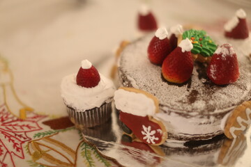 Christmas Cake with strawberries and cookies