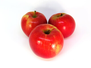 Three  red-yellow apple on white background.
