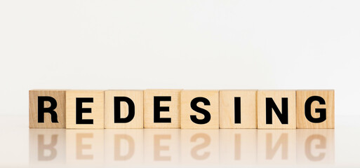 REDESIGN word made with building blocks