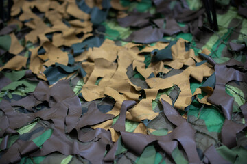 A macro shot of a camouflage net