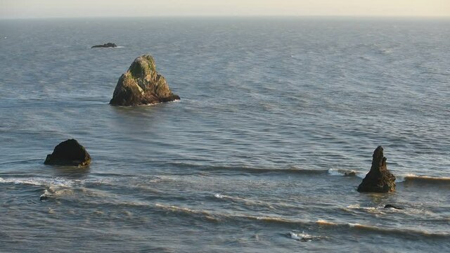 waves lapping at the rocky shore