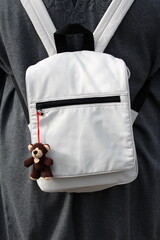 Light grey small unisex classic vintage retro design backpack made of durable water resistant...