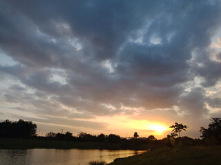 Obraz premium sunset over the river