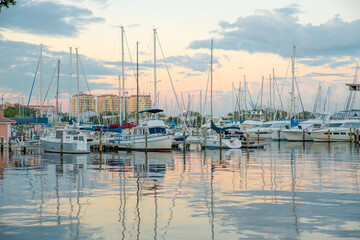 Harbor with sailboats. Private sail boats or luxury yacht. Calm in the ocean.