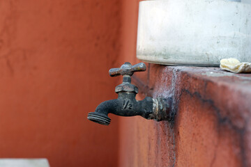 Close up picture of old rusty tap