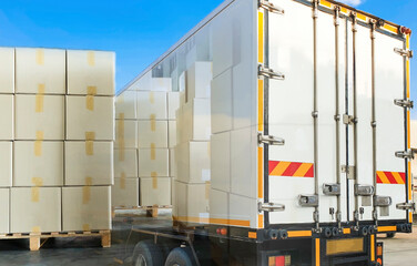 Obraz premium Double exposure of cargo boxes and container trialer truck. Shipment boxes. Industry road freight transport by truck.