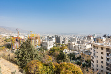 Obraz premium City view of Tehran City with modern buildings, Iran , view form mountain Tochal climbing route.