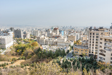 City view of Tehran City with modern buildings, Iran , view form mountain Tochal climbing route.