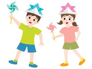 こどもの日にかざぐるまで遊ぶ子供たち