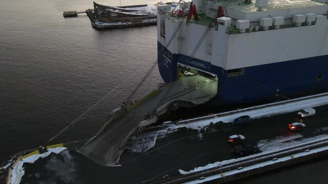 Aerial Timelapse of Vehicle Carrier Unloading Cars at Port
