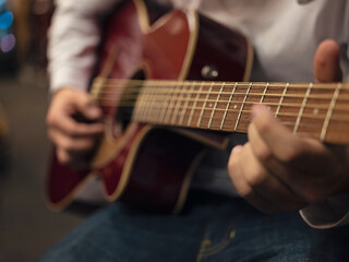 Fototapeta na wymiar person playing guitar