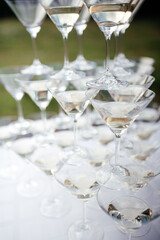 wine glasses standing in a pyramid at the celebration