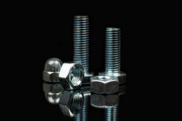 a few bolts and nuts made of silver metal