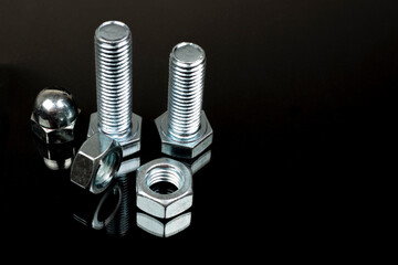 a few bolts and nuts made of silver metal