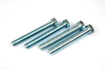 long metal bolts on white background