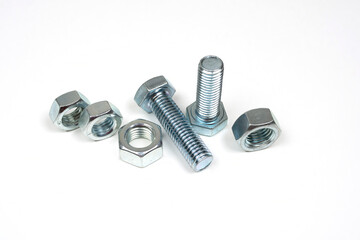 metal bolts and nuts on a white background