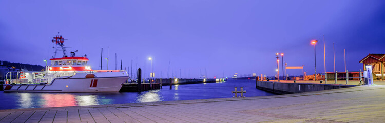 Kiel harbor with Christmas and New Years atmosphere at night.