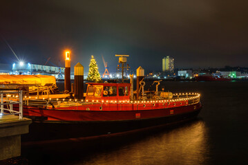 Kiel harbor with Christmas and New Years atmosphere at night.