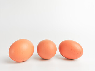 A bunch of chicken eggs isolated on white background.