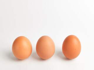 A bunch of chicken eggs isolated on white background.