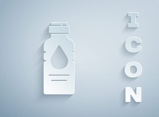 Paper cut Bottle of water icon isolated on grey background. Soda aqua drink sign. Paper art style. Vector Illustration.
