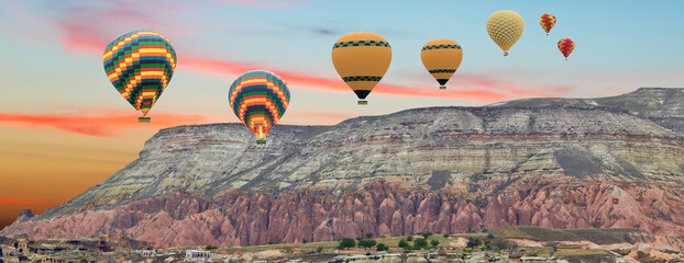 balloon air hot flight travel mountain sunset landscape nature. © Emoji Smileys People