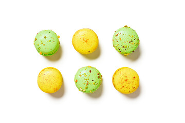 Differents colored macaroons isolated on white. Top view