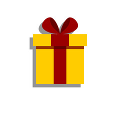 New year yellow gift with red ribbon on white background. Новогодний желтый подарок с красной лентой на белом фоне.