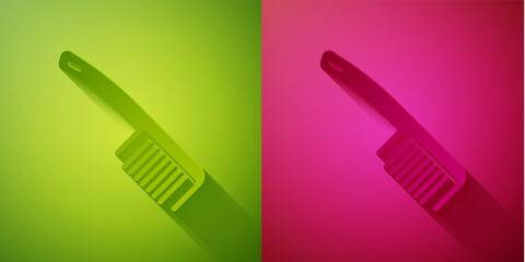 Paper cut Hairbrush icon isolated on green and pink background. Comb hair sign. Barber symbol. Paper art style. Vector.