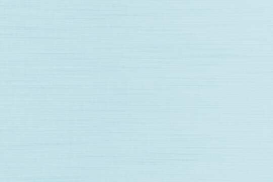 Light blue fabric background of satin silk wallpaer texture cotton canvas cloth pattern