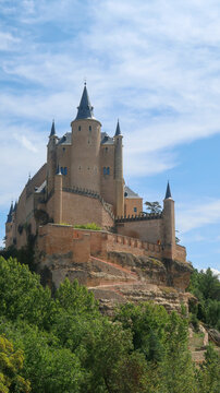 A low angle view of the famous tower of Alcazar of Segovia located in Spain. Castle of Segovia towern