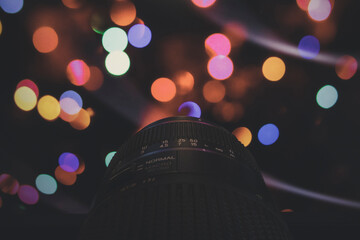 lens focusing on colored lights with bokeh effect