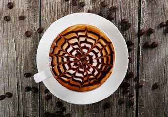 hot beverage coffee cappuccino wooden background with coffee beans 