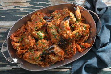 granchio in salsa di pomodoro