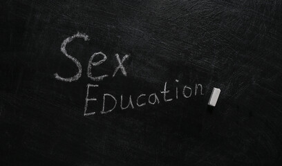 Words sex education chalk hand drawn on blackboard