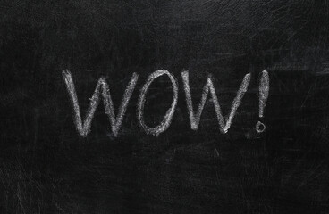 Obraz premium Word WOW! chalk hand drawn on blackboard