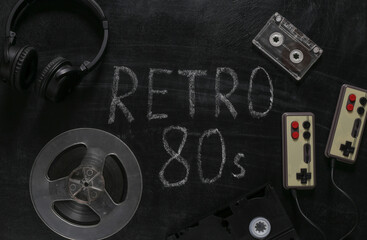 Retro devices and Word retro 80s chalk hand drawn on blackboard