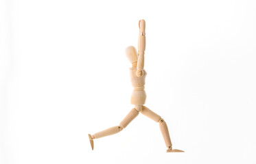 Wooden puppet practicing yoga asana pose isolated on white background