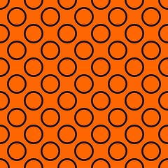 Tile vector pattern with big black polka dots on orange background