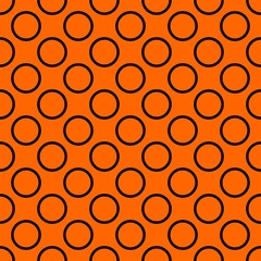 Tile vector pattern with big black polka dots on orange background